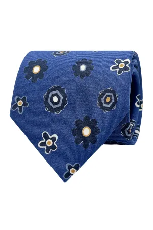 Blue tie in pure silk printed with blue flowers and geometrical design