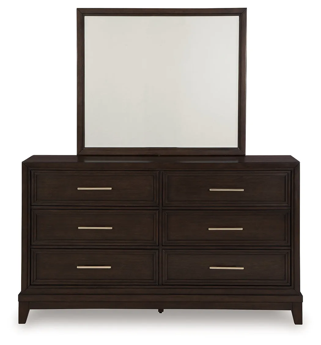 Neymorton California King Upholstered Panel Bed with Mirrored Dresser and Chest in Dark Grayish Brown