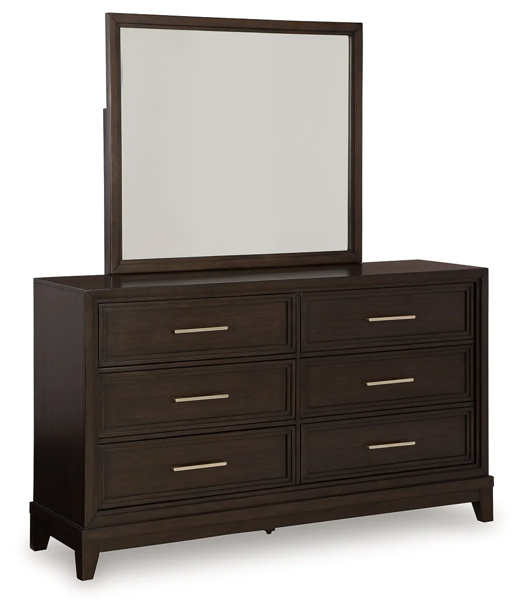 Neymorton California King Upholstered Panel Bed with Mirrored Dresser and Chest in Dark Grayish Brown